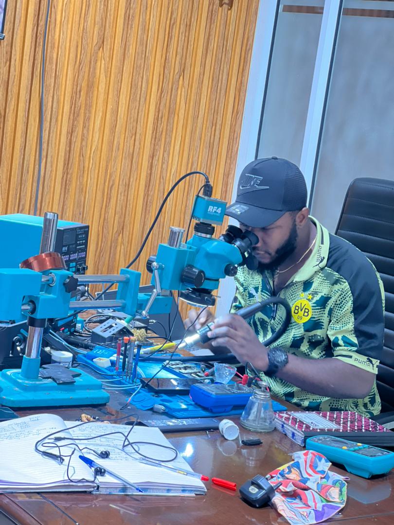 Our technician at work on a phone repair
